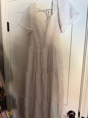 White maxi dress with floral detailing